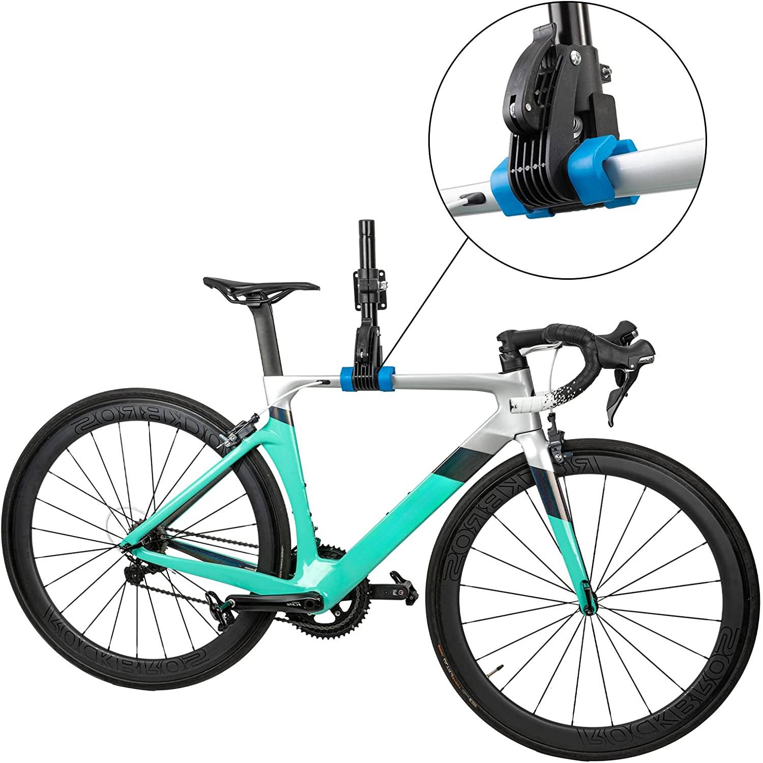 A bicycle clamped in a repair work stand at working height